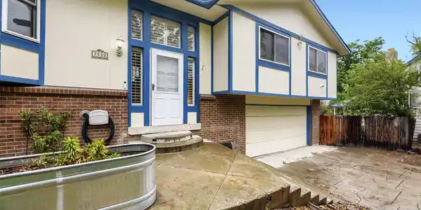 Image 3: Large front patio and oversized garage Image 3: Large front patio and oversized garage