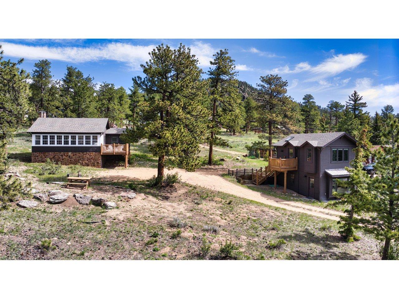 Image 3: The .44 acre lot on High Drive holds 2 buildings: the Main Cabin and the 2-story Bunkhouse. Image 3: The .44 acre lot on High Drive holds 2 buildings: the Main Cabin and the 2-story Bunkhouse.