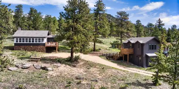 Image 3: The .44 acre lot on High Drive holds 2 buildings: the Main Cabin and the 2-story Bunkhouse. Image 3: The .44 acre lot on High Drive holds 2 buildings: the Main Cabin and the 2-story Bunkhouse.