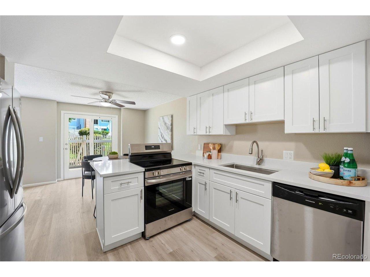 Image 2: Fully Renovated Kitchen with Quartz Countertops and New Stainless Steel Appliances Image 2: Fully Renovated Kitchen with Quartz Countertops and New Stainless Steel Appliances
