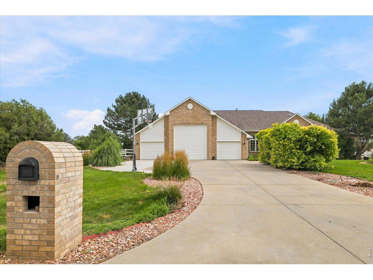 Image 4: Expansive driveway parking. 3 car garage with RV door. Image 4: Expansive driveway parking. 3 car garage with RV door.