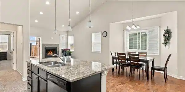 Image 4: Freestanding island with stone countertop. Image 4: Freestanding island with stone countertop.