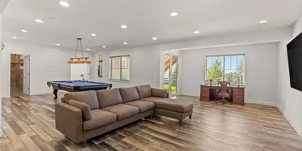 Image 4: Finished walkout lower level with generous recreation and entertaining space. Image 4: Finished walkout lower level with generous recreation and entertaining space.