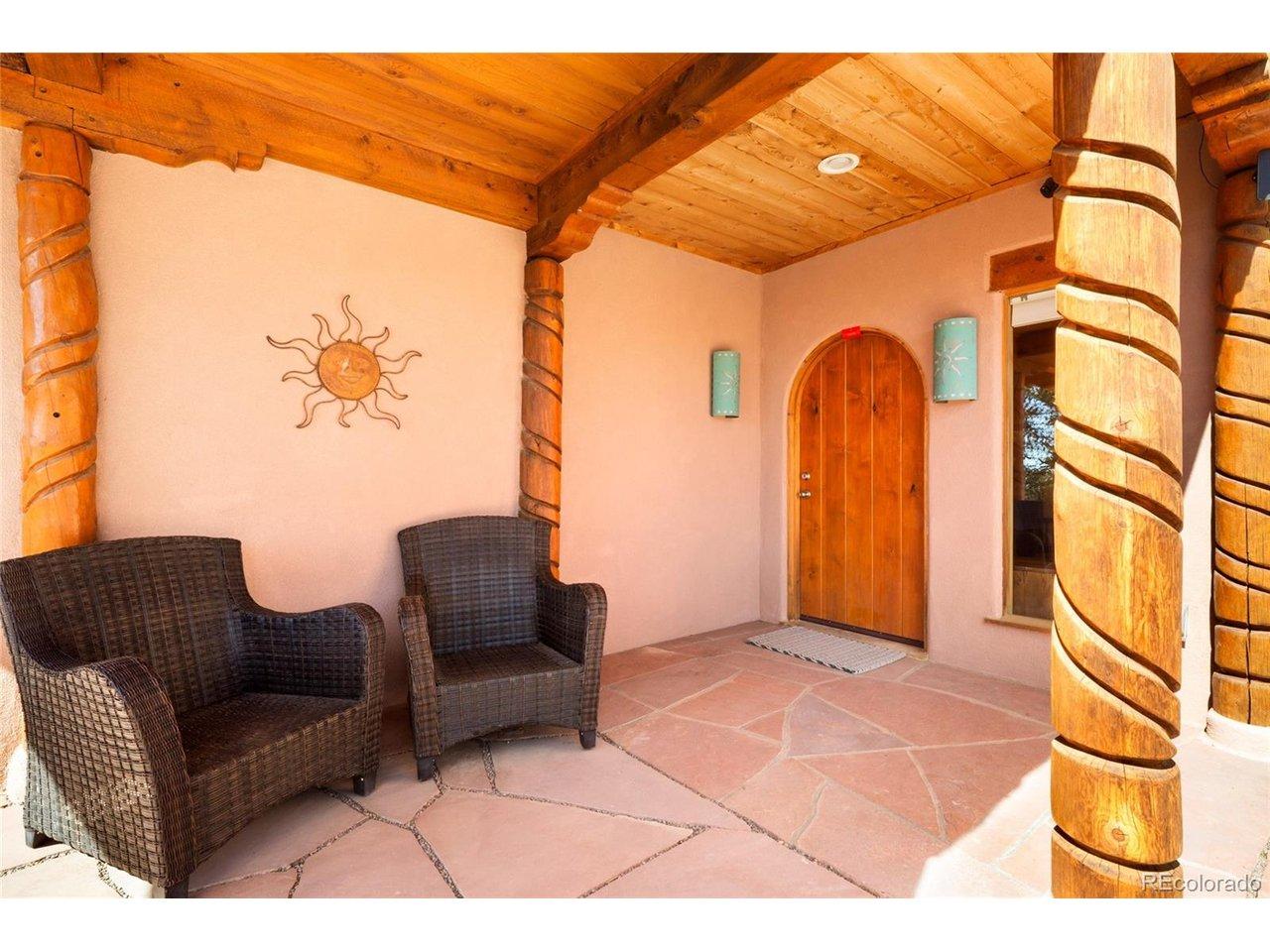 Image 3: Front covered porch with custom front door Image 3: Front covered porch with custom front door