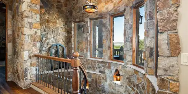 Image 4: Curved main staircase to lower level Image 4: Curved main staircase to lower level