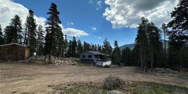 Image 3: View of cabin & shed looking NE