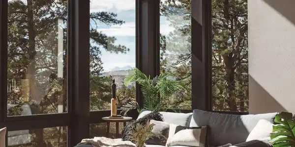 Image 4: Windows from floor to ceiling with views of longs peak Image 4: Windows from floor to ceiling with views of longs peak