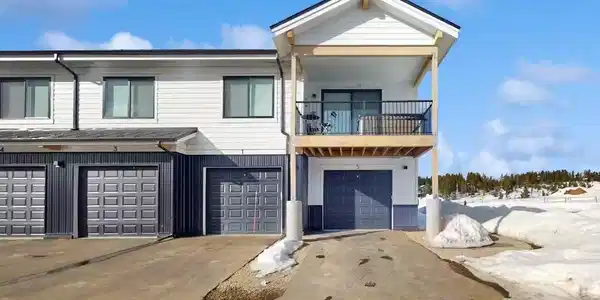 Image 4: Exterior of unit~ End Unit with oversized, heated garage (detached access) Image 4: Exterior of unit~ End Unit with oversized, heated garage (detached access)