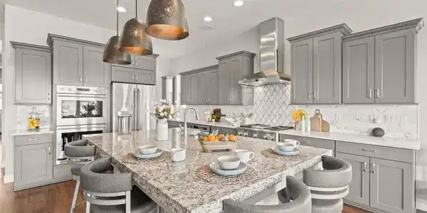 Image 4: Massive custom island with 2.5" granite - perfect for casual dining Image 4: Massive custom island with 2.5" granite - perfect for casual dining