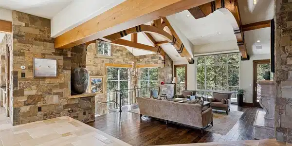 Image 3: Reclaimed wood sourced from historic Montana corrals has been masterfully integrated into the architectural design
