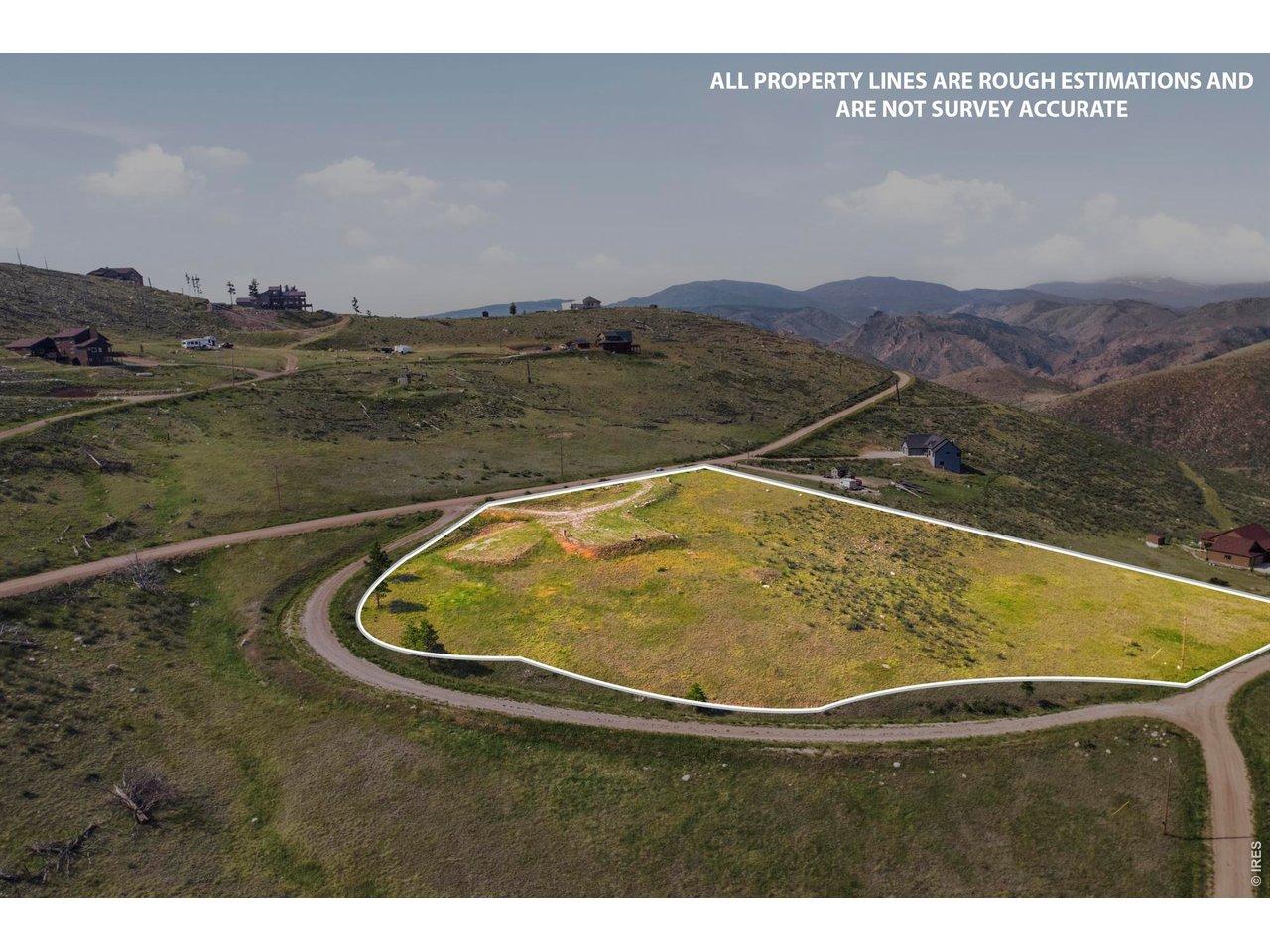 Image 3: 3.65 acres of gentle grassy slope. Build site already graded. Image 3: 3.65 acres of gentle grassy slope. Build site already graded.