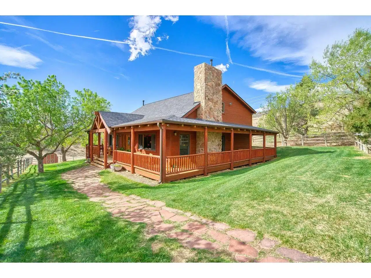 Image 1: Beautiful home and yard. Wrap around porch for 130' and cedar siding. Image 1: Beautiful home and yard. Wrap around porch for 130' and cedar siding.