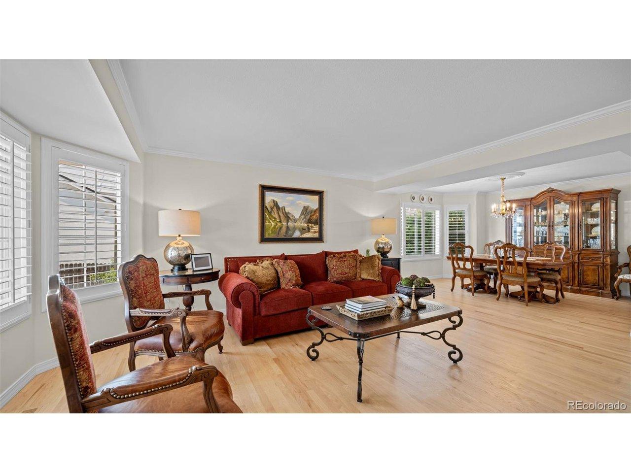 Image 3: Notice all the updates with crown molding, newer flooring and trim