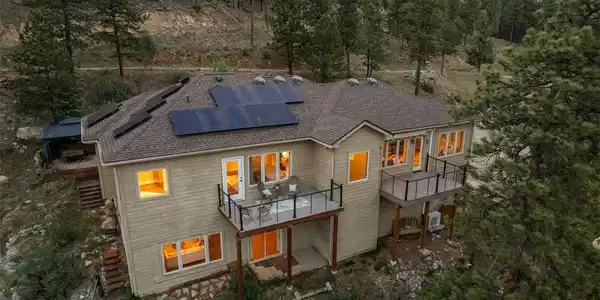 Image 3: East Facing Custom Contemporary Balcony/Decks overlooking Bear Creek Canyon great places to hear the sounds of the Creek.Seller owned Solar supplies electricity throughout the year.. Image 3: East Facing Custom Contemporary Balcony/Decks overlooking Bear Creek Canyon great places to hear the sounds of the Creek.Seller owned Solar supplies electricity throughout the year..