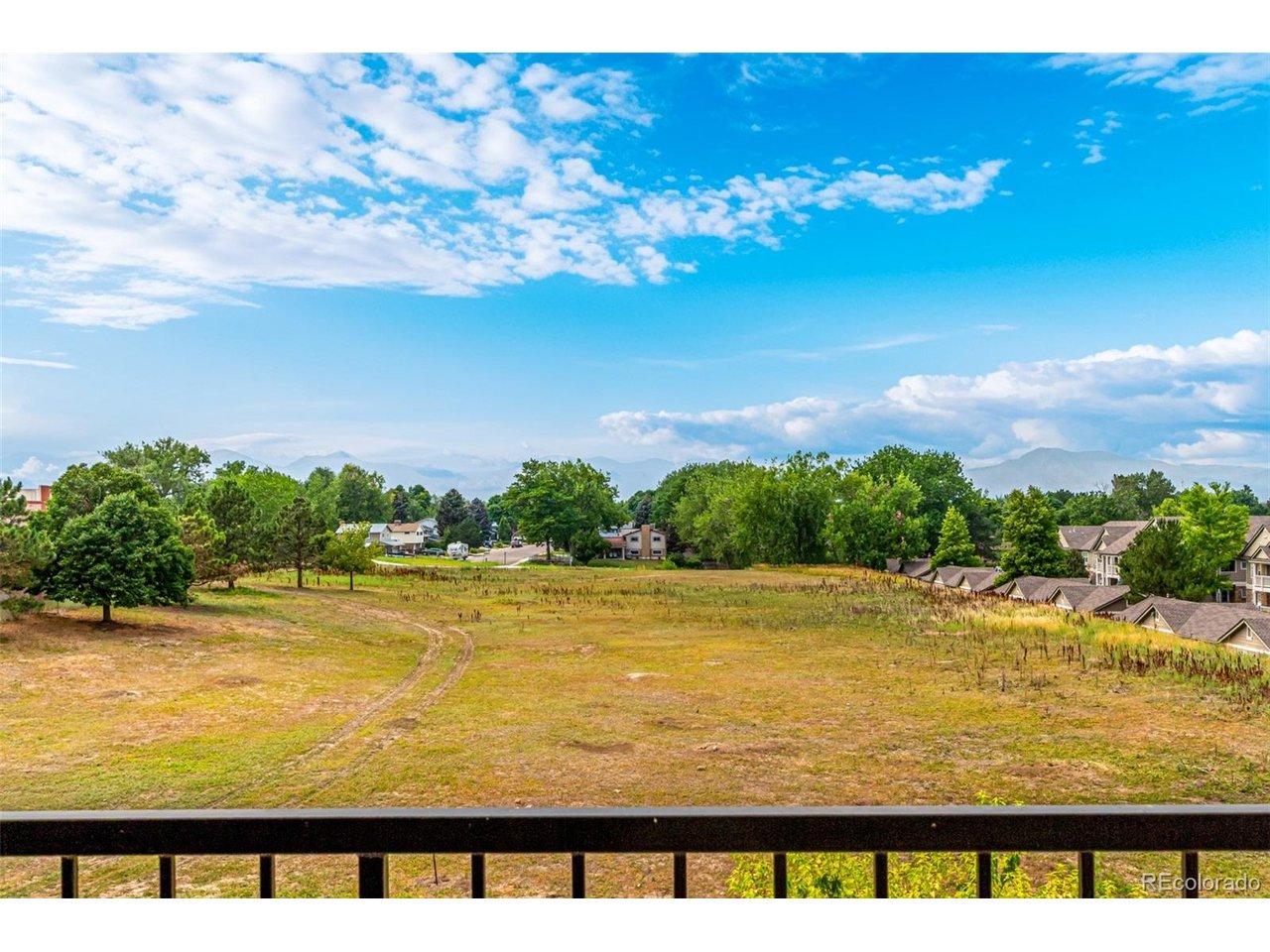 Image 3: Balcony faces west with mountain views and open space! Image 3: Balcony faces west with mountain views and open space!