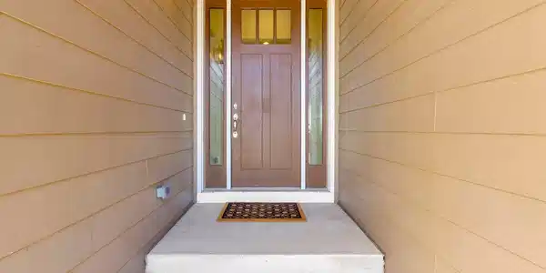 Image 4: A charming covered entry creates a warm and elegant welcome into this thoughtfully designed home. Image 4: A charming covered entry creates a warm and elegant welcome into this thoughtfully designed home.