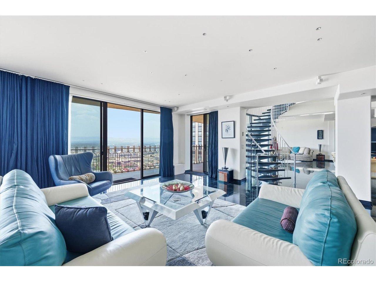 Image 2: Expansive great room with panoramic Downtown Denver and Rocky Mountain views. Image 2: Expansive great room with panoramic Downtown Denver and Rocky Mountain views.