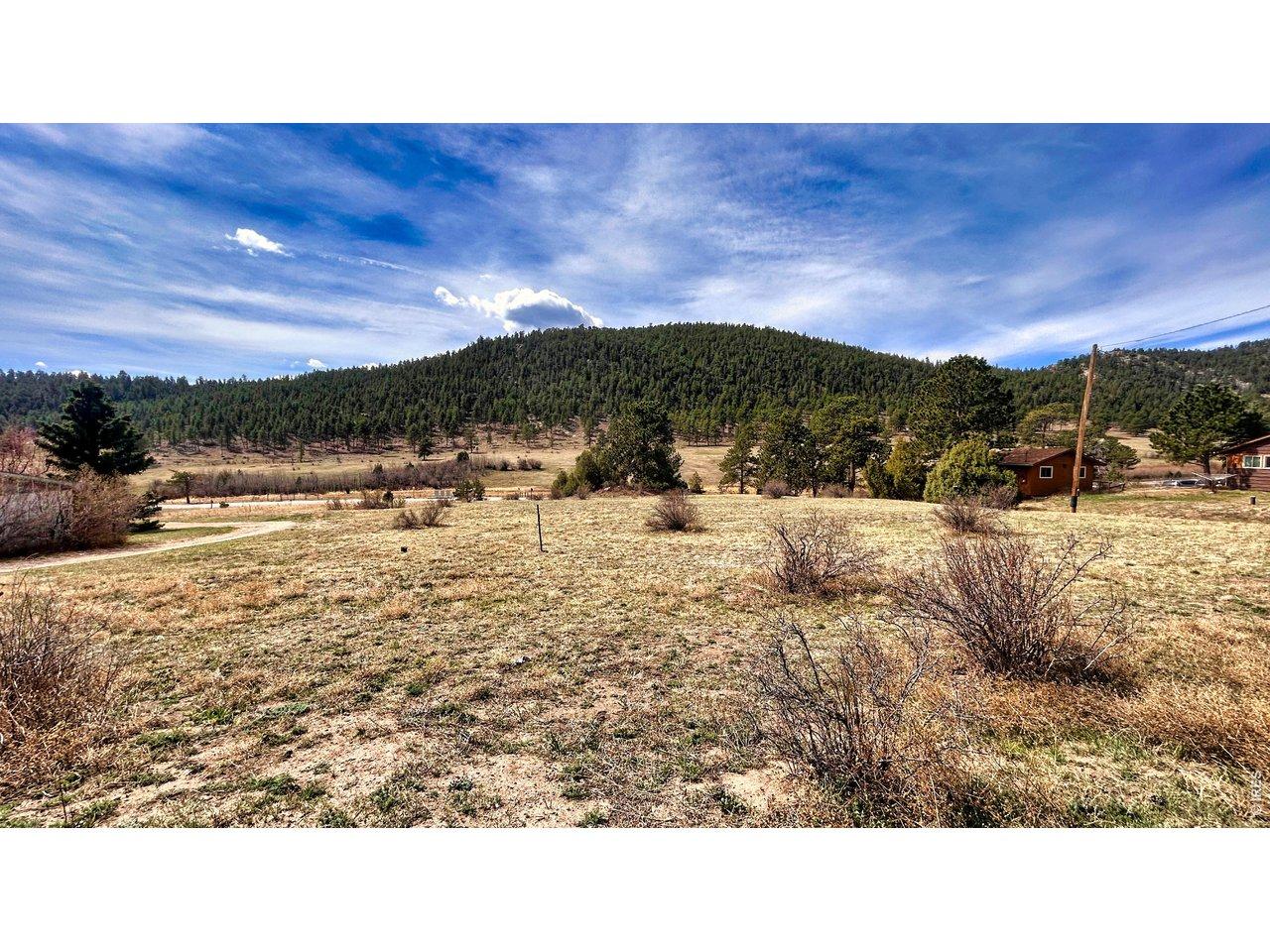 Image 4: Your mountain getaway awaits. This beautiful parcel of land features dramatic views, natural landscaping, and the perfect setting for a custom home. Image 4: Your mountain getaway awaits. This beautiful parcel of land features dramatic views, natural landscaping, and the perfect setting for a custom home.