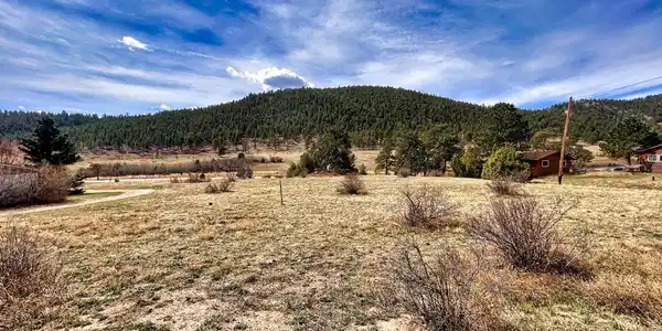 Image 4: Your mountain getaway awaits. This beautiful parcel of land features dramatic views, natural landscaping, and the perfect setting for a custom home. Image 4: Your mountain getaway awaits. This beautiful parcel of land features dramatic views, natural landscaping, and the perfect setting for a custom home.