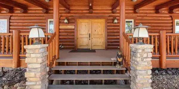 Image 3: Double entry doors and large wrap around deck to welcome you home! Image 3: Double entry doors and large wrap around deck to welcome you home!