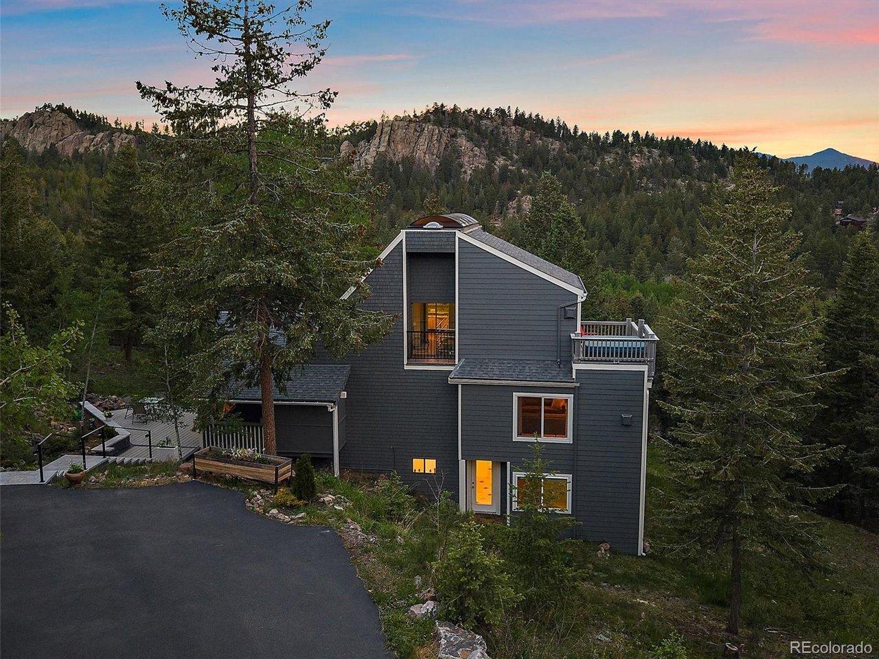 Image 1: Beautiful mountain contemporary on two pristine acres in sought after Evergreen Highlands. Image 1: Beautiful mountain contemporary on two pristine acres in sought after Evergreen Highlands.