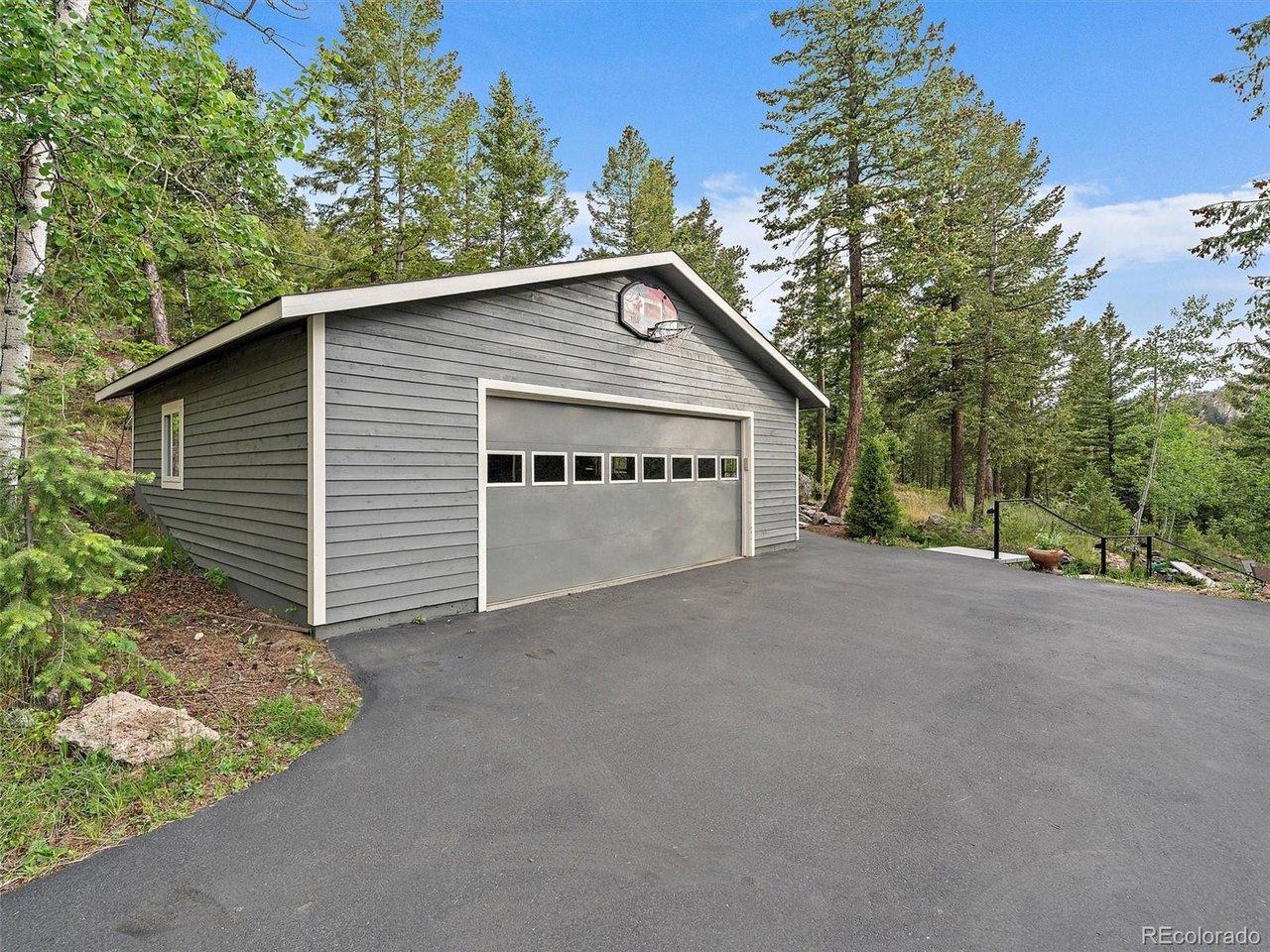 Image 4: Extra wide detached garage.... Image 4: Extra wide detached garage....