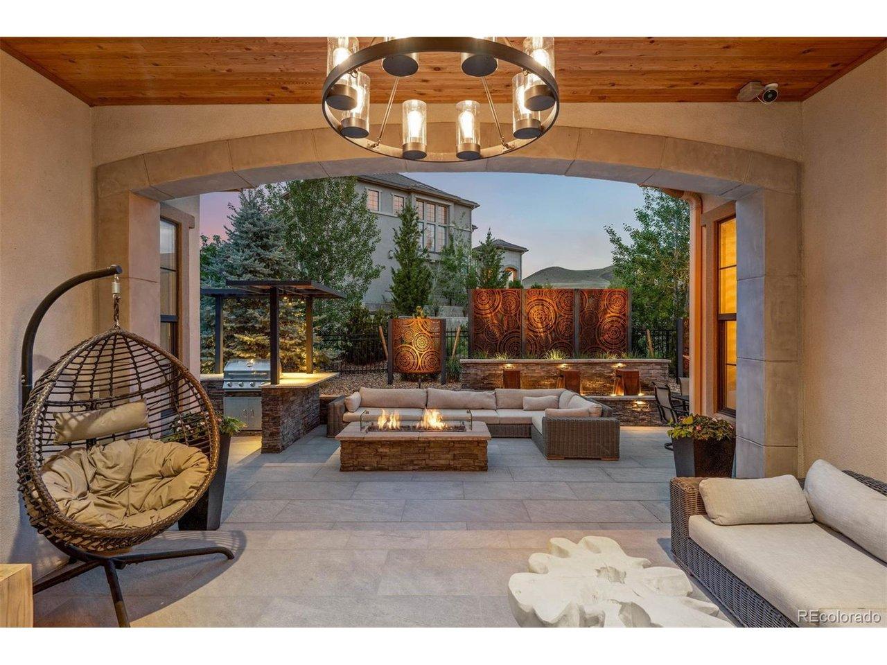 Image 3: Views of Green Mountain from the 12' glass sliders overlooking a covered patio and backyard. Image 3: Views of Green Mountain from the 12' glass sliders overlooking a covered patio and backyard.