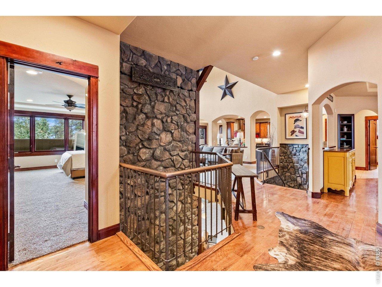 Image 4: Main Level to Basement Stone Waterfall Feature