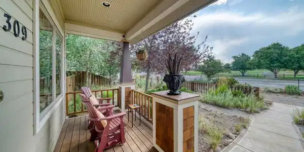Image 4: Covered front porch to sit and enjoy life