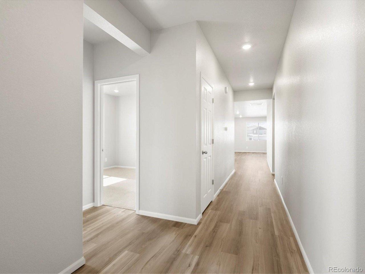 Image 2: *Interior photos are representative only and not of the actual home. Actual elevations, appliance models and interior finishes may vary.