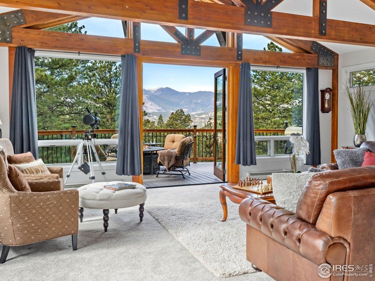Image 3: Open Concept floor plan with Custom Beamed Ceilings and look at those views!! Image 3: Open Concept floor plan with Custom Beamed Ceilings and look at those views!!