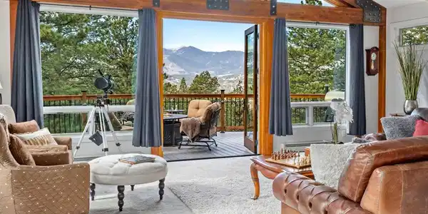 Image 3: Open Concept floor plan with Custom Beamed Ceilings and look at those views!! Image 3: Open Concept floor plan with Custom Beamed Ceilings and look at those views!!