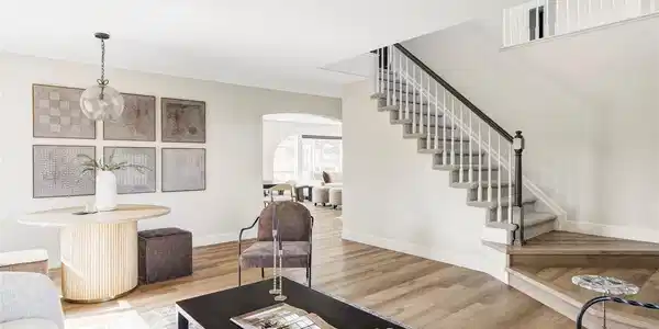 Image 4: Living room and additional dining room/ bonus room located off of the entry way. Image 4: Living room and additional dining room/ bonus room located off of the entry way.