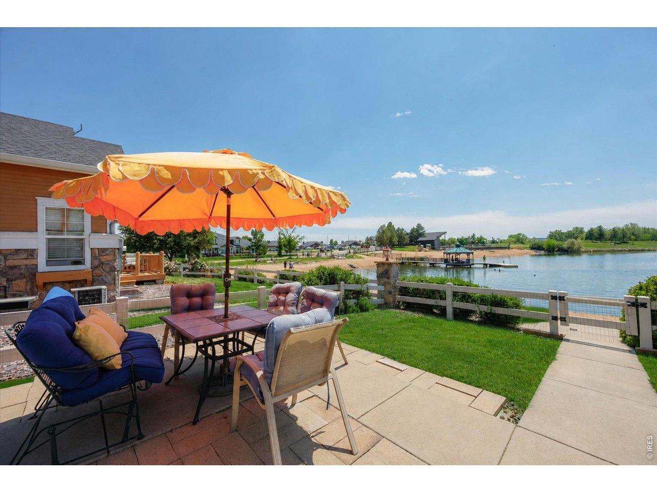 Image 1: Two Story Town Home with Finished Basement Sitting Directly on the Lake In Resort Style Community of Water Valley! Image 1: Two Story Town Home with Finished Basement Sitting Directly on the Lake In Resort Style Community of Water Valley!