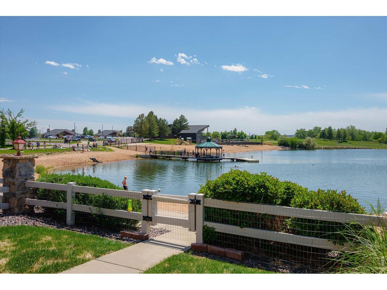 Image 2: Private Fenced Front Yard & Entry to Townhome Sitting Directly on the Beach Facing the Lake, Golf Course & Mountain Views! Image 2: Private Fenced Front Yard & Entry to Townhome Sitting Directly on the Beach Facing the Lake, Golf Course & Mountain Views!