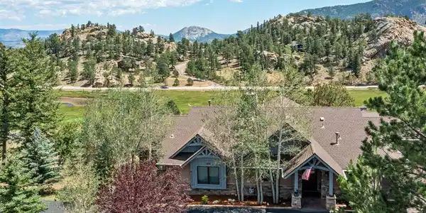 Image 3: Situated on paved, city-maintained roads just off Highway 7, this home delivers year-round livability with the best of both worlds: peaceful mountain living and easy access to everything the Estes Park area has to offer. Image 3: Situated on paved, city-maintained roads just off Highway 7, this home delivers year-round livability with the best of both worlds: peaceful mountain living and easy access to everything the Estes Park area has to offer.
