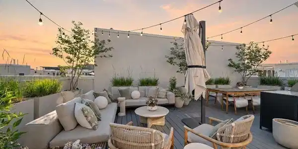 Image 2: Sunset on the rooftop patio Image 2: Sunset on the rooftop patio