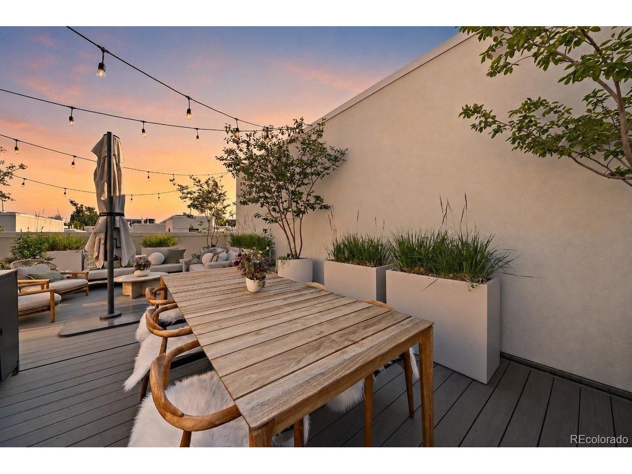 Image 3: Rooftop patio dining area