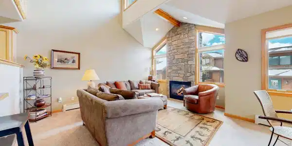 Image 3: A Beautiful Open Floor plan with volume ceilings, Stone gas fireplace and expansive windows. Look at all the natural light flooding this space. Image 3: A Beautiful Open Floor plan with volume ceilings, Stone gas fireplace and expansive windows. Look at all the natural light flooding this space.