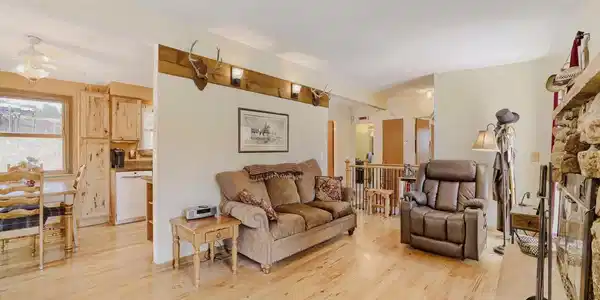 Image 3: Lovely living room with gorgeous hickory floors. Image 3: Lovely living room with gorgeous hickory floors.