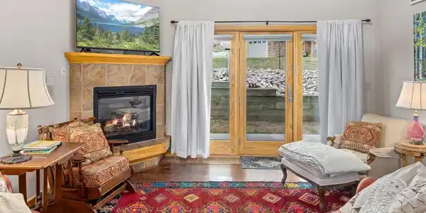 Image 3: Main-Level Living Room with Gas Fireplace Image 3: Main-Level Living Room with Gas Fireplace
