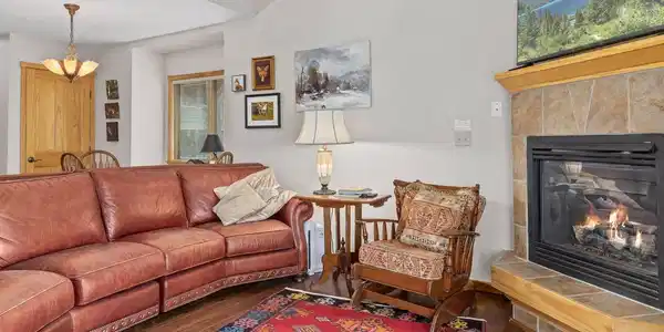 Image 4: Main-Level Living Room with Gas Fireplace Image 4: Main-Level Living Room with Gas Fireplace