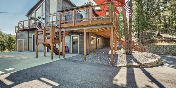 Image 4: Front side w/workshop, garage, shed, concrete driveway w/paved parking and driveway to street. Image 4: Front side w/workshop, garage, shed, concrete driveway w/paved parking and driveway to street.