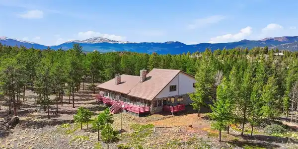 Image 2: Mountain and meadow views off the patio and the 3.45 acres!