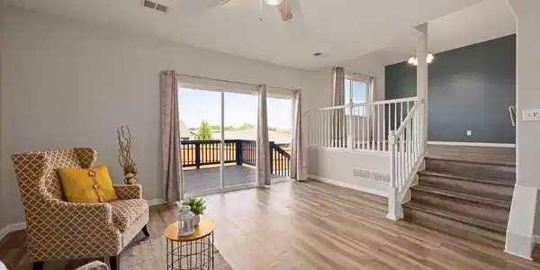 Image 4: Living area with oversized sliding door. This home is flooded with natural light Image 4: Living area with oversized sliding door. This home is flooded with natural light