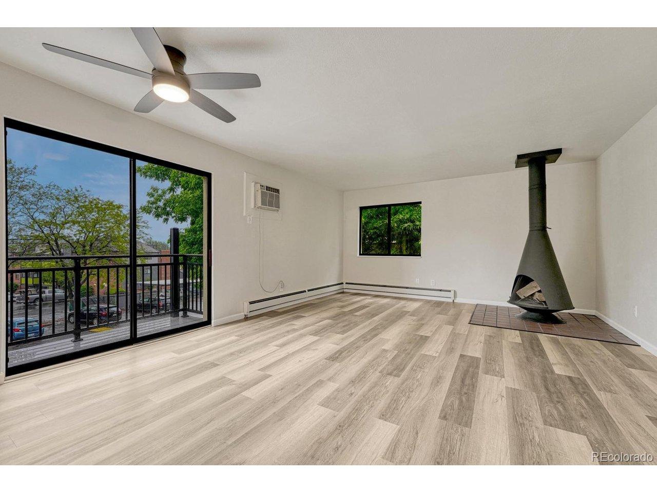 Image 4: Wood burning fireplace in family room.