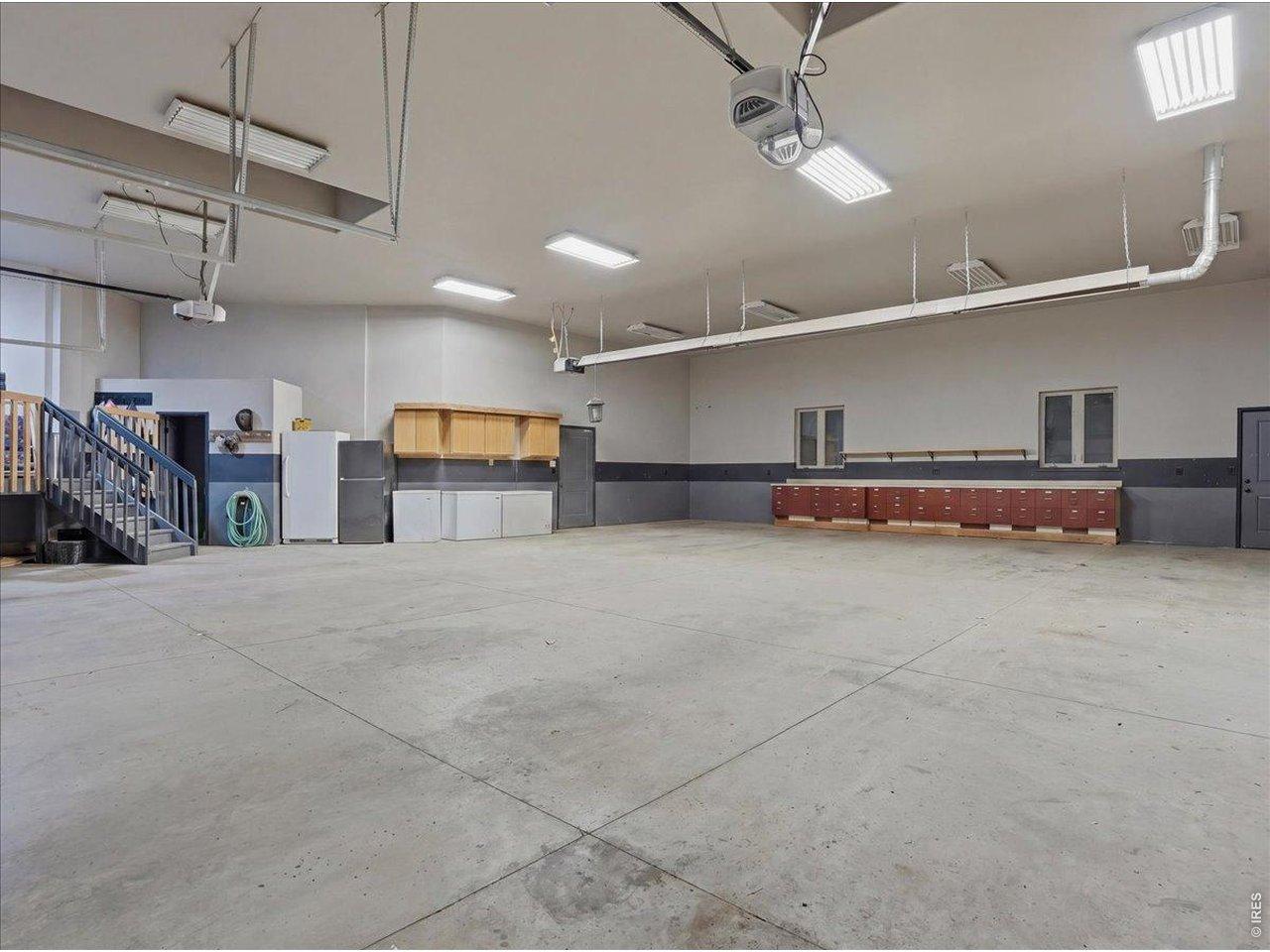 Image 4: 8 car garage w/ half bathroom inside the garage. Shops are allowed! Image 4: 8 car garage w/ half bathroom inside the garage. Shops are allowed!