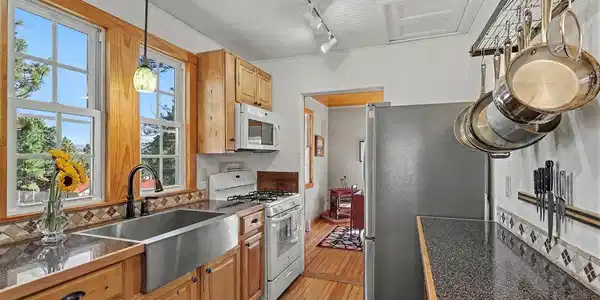 Image 4: Kitchen with Mountain Views from the Kitchen Sink. Image 4: Kitchen with Mountain Views from the Kitchen Sink.