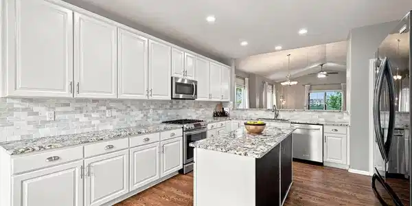 Image 4: Kitchen with abundant cabinet space. Image 4: Kitchen with abundant cabinet space.
