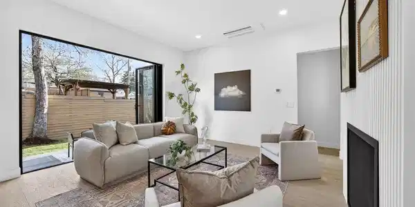 Image 4: Indoor/outdoor living room with retractable door Image 4: Indoor/outdoor living room with retractable door